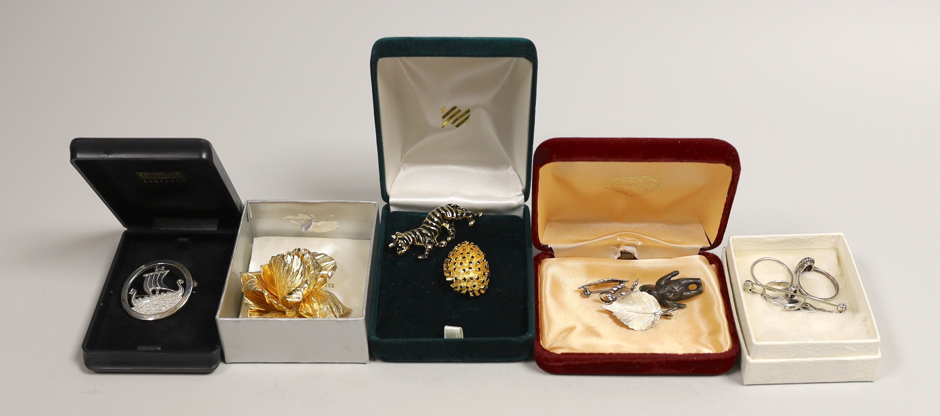 A Christian Dior costume rose brooch, 6cm, in box and a small group of sterling, white metal and costume jewellery, including Ortak Longship brooch.